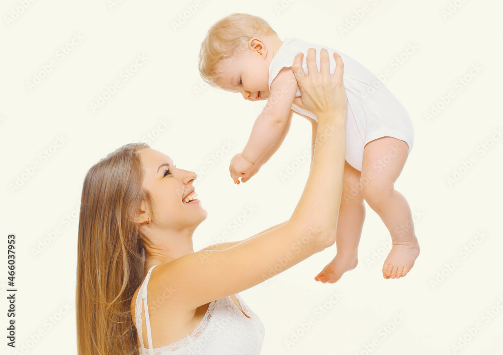 Portrait of happy cheerful smiling mother and baby playing together on a white background Portrait of happy cheerful smiling mother and baby playing together on a white background