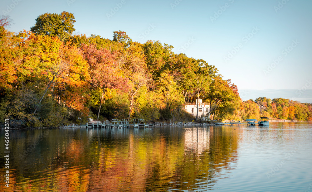 The first morning light hits the shoreline of a lake in Waukesha County, Wisconsin on a cold autumn morning. The first morning light hits the shoreline of a lake in Waukesha County, Wisconsin on a cold autumn morning.