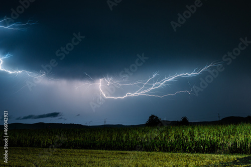 Lightning discharge in the air over a corn field in rural Transylvania, Romania