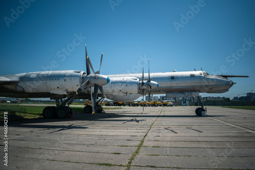Old plane. Hull, chassis, engines and propellers of an old plane. large, cargo, military aircraft with a large payload