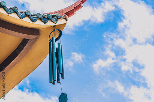 Canvas Print E Pagoda curved roof building temple, metal big hanging wind sound bell chime effect melodious buddhism china