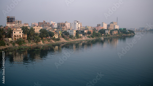 Picture of one side of Dhaka city on the banks of river Buriganga.The river Buriganga has enhanced the beauty of the capital city Dhaka.