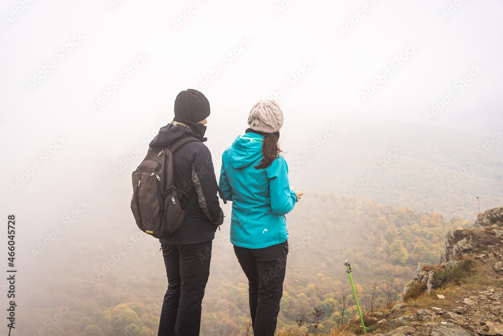 Couple walking in the mountains