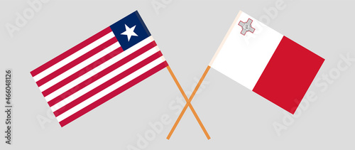 Crossed flags of Liberia and Malta. Official colors. Correct proportion