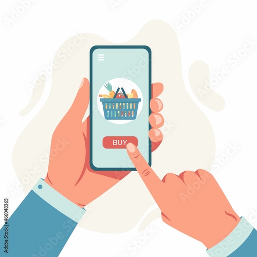 Hand holing smart phone with shopping basket and buy button on the screen. Mobile payment concept. Smartphone wireless money transfer. Flat design.