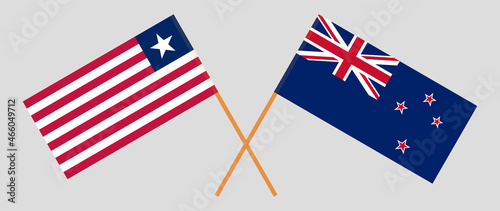 Crossed flags of Liberia and New Zealand. Official colors. Correct proportion