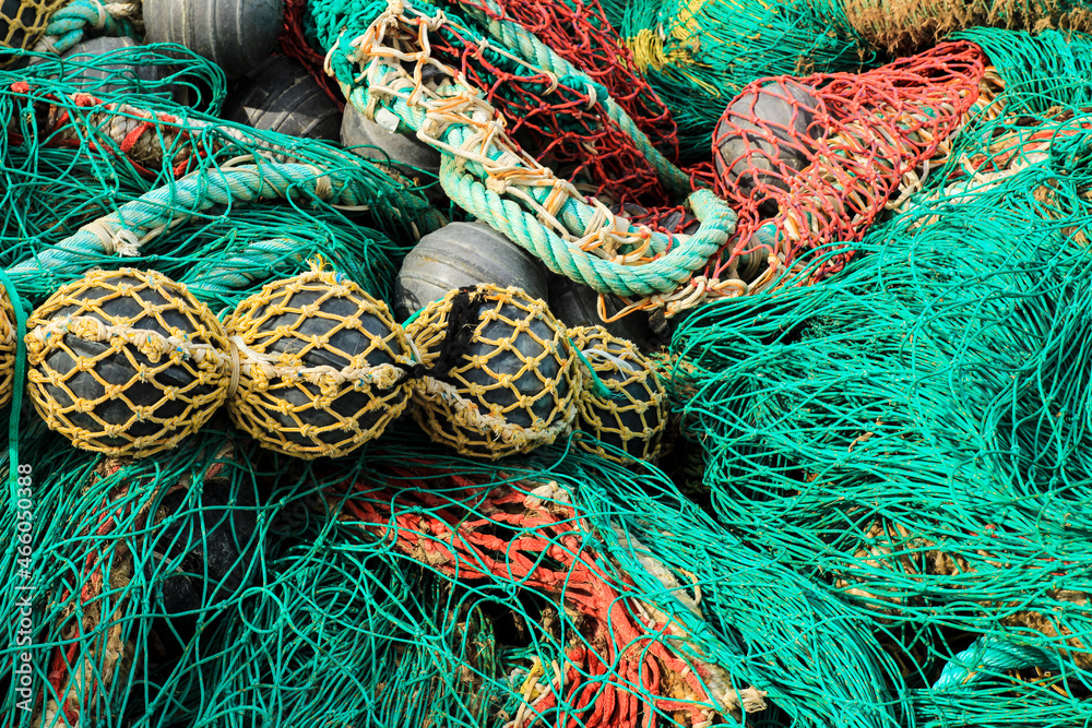 Fishing nets, buoys and ropes in the port