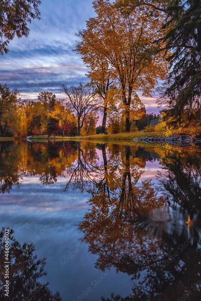 Obraz premium Autumn Trees Reflected On The Water