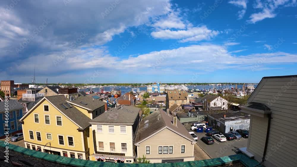 Time lapse video of New Bedford historic city center aerial view with harbor and fishing boats at the background in downtown of New Bedford, Massachusetts MA, USA. Time lapse video of New Bedford historic city center aerial view with harbor and fishing boats at the background in downtown of New Bedford, Massachusetts MA, USA.