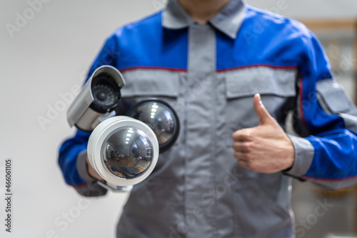 Technician Using Surveillance Security Camera Video