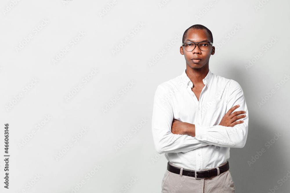 Portrait of a confident black business man looking at camera with copy space. Portrait of a confident black business man looking at camera with copy space.