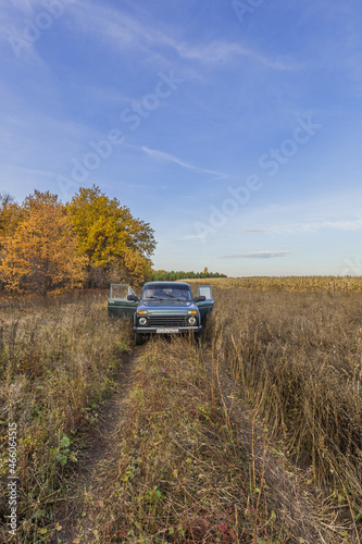 Russian SUV in autumn in nature