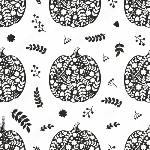 Halloween pumpkin. Vector seamless pattern with silhouettes of pumpkins. Black and white