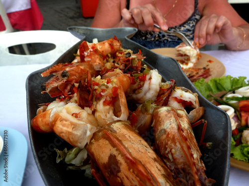Delicious fresh cooked and grilled whole Lobster. Thai BBQ lobster, mookata ,Thai buffet restaurant, grilled seafood