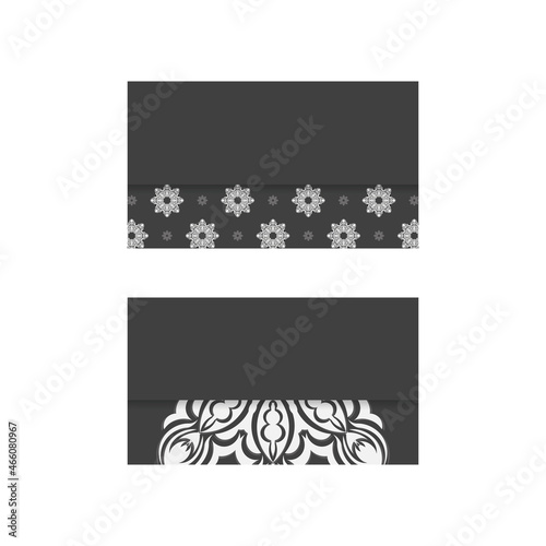 Business card in black with an abstract white pattern for your business.