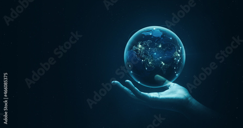 Fototapeta Naklejka Na Ścianę i Meble -  Hand holding global virtual internet world connection of metaverse technology network digital communication and worldwide networking on connect 3d background. Elements of this image furnished by NASA.