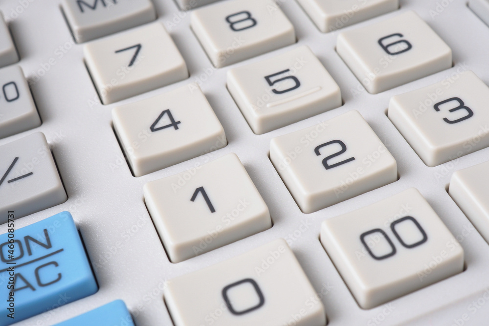 Gray calculator keyboard buttons close up. Light background or wallpaper. Economy, finance, money, commerce. Bank, credit, loan, deposit, interest. Business project and decision making. Macro Gray calculator keyboard buttons close up. Light background or wallpaper. Economy, finance, money, commerce. Bank, credit, loan, deposit, interest. Business project and decision making. Macro