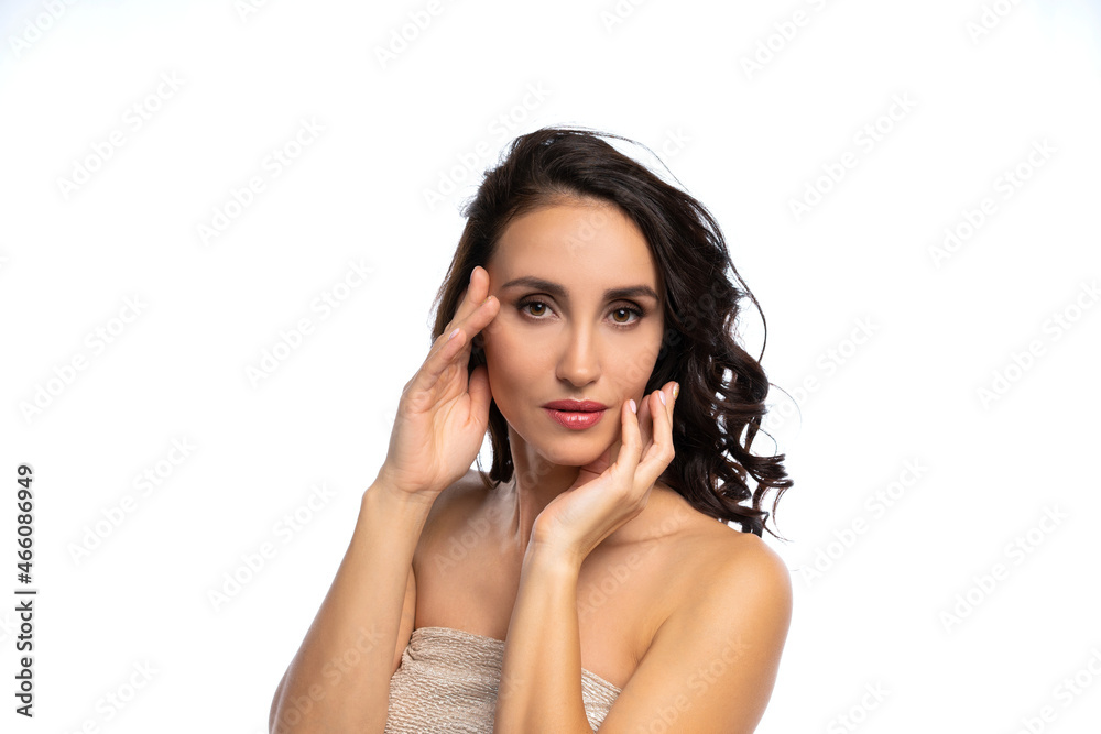 close-up portrait of a woman. beauty industry. personal care. the girl in the studio shows the zones on the face. isolated white background close-up portrait of a woman. beauty industry. personal care. the girl in the studio shows the zones on the face. isolated white background