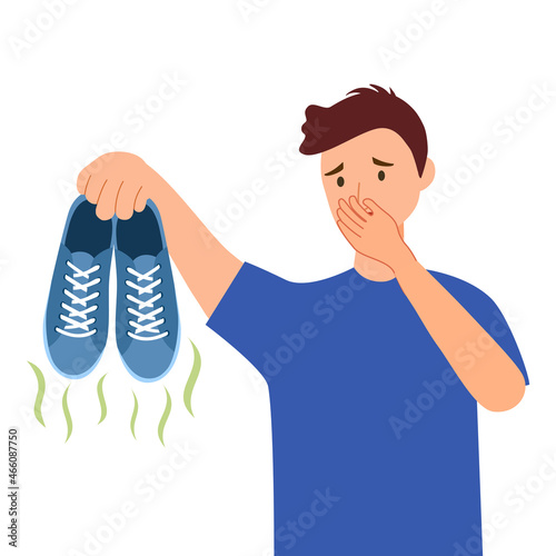 Young man holding smelly shoe and cover his nose in flat design on white background.