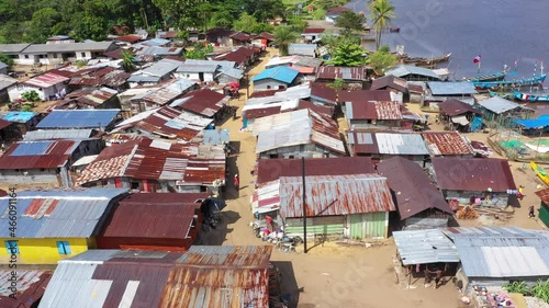 Aerial poor Liberia African fishing village Africa. West Africa country dark history Civil wars, Ebola and COVID and economic failures stagnated economic growth. Poverty, no jobs or industry.