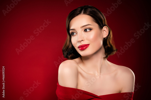 Tender photo of dreamy minded model lady look empty space wear red pomade isolated on dark burgundy color background
