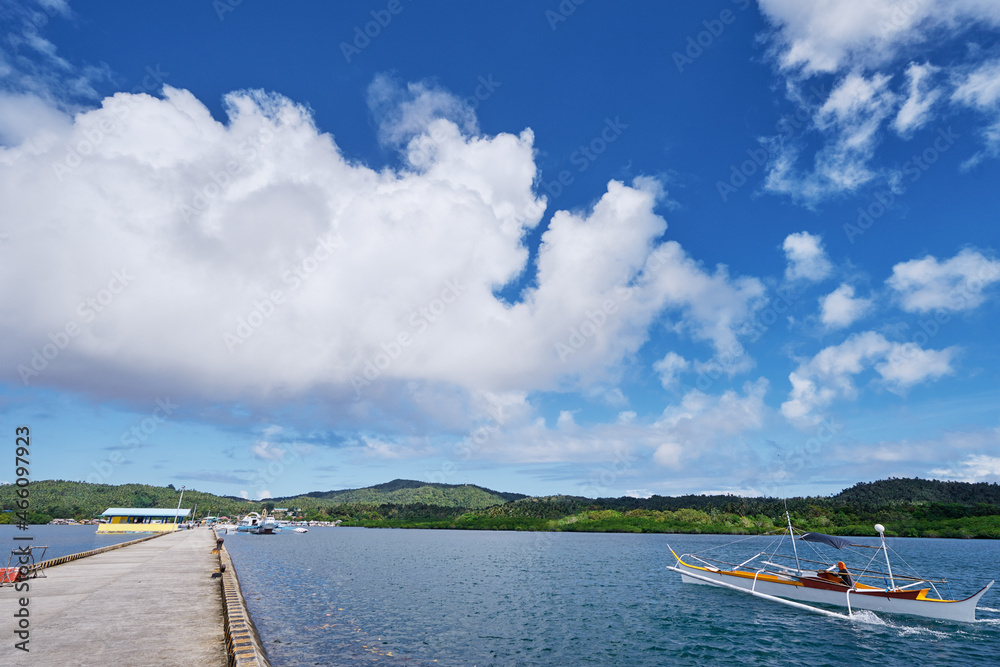 Concrete pier on the sea shore in beautiful sunny day. Concrete pier on the sea shore in beautiful sunny day.