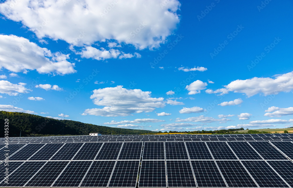 solar panels with the sunny sky. Blue solar panels. background of photovoltaic modules for renewable energy solar panels with the sunny sky. Blue solar panels. background of photovoltaic modules for renewable energy