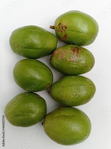 Kedondong fruit is green with a white background