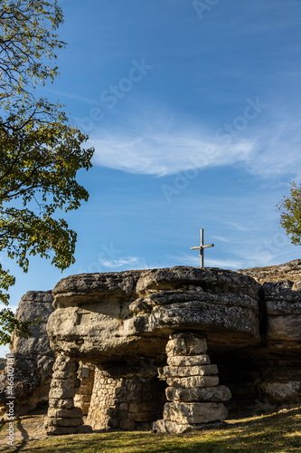 Cave-temple of pre-Christian time Pagan IX century in the village of Monastyrok in Ukraine photo