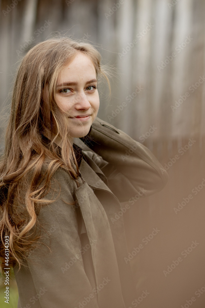 Fototapeta premium Portrait of young beautiful girl in outdoors