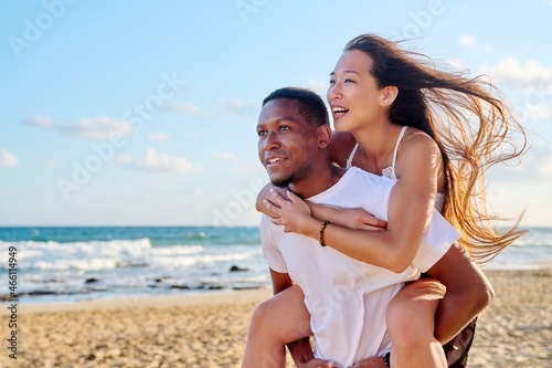 Young beautiful having fun couple on the sea background © Valerii Honcharuk