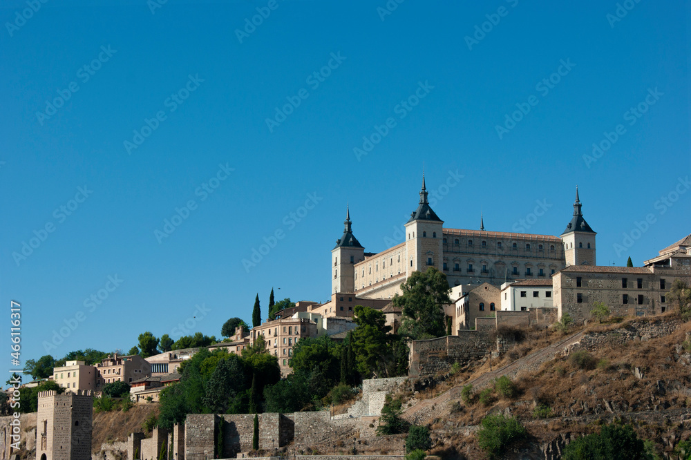 Toledo, Spain The beautiful El Alcazar castle rising high over the historic, medieval city  Landscape aspect view with copy space