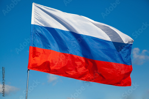 Tricolor flag of Russia waving in the wind close
