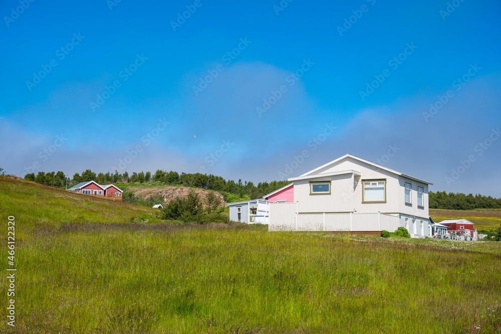 Buildings on Island of Hriesy in Eyjafjordur in Iceland Buildings on Island of Hriesy in Eyjafjordur in Iceland