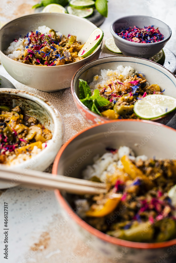 Delicious traditional asian curry in bowls. Delicious traditional asian curry in bowls.