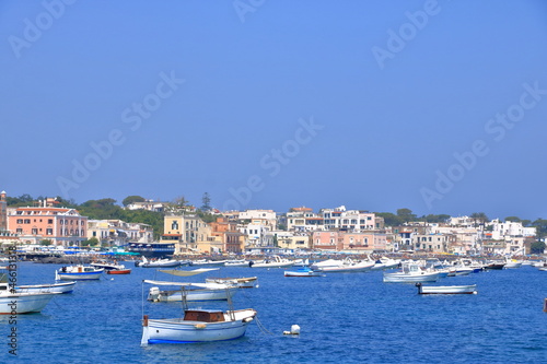 boats in front of the coast and beach in Ischia  Italy