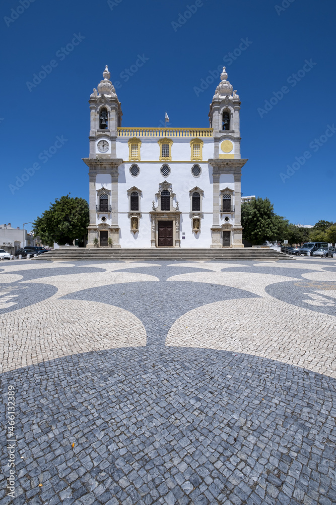 traditional portuguese pavement in front of the Church of the Third Order of Nossa Senhora do Monte do Carmo, Our Lady of Mount Carmel in Faro, Algarve, portugal