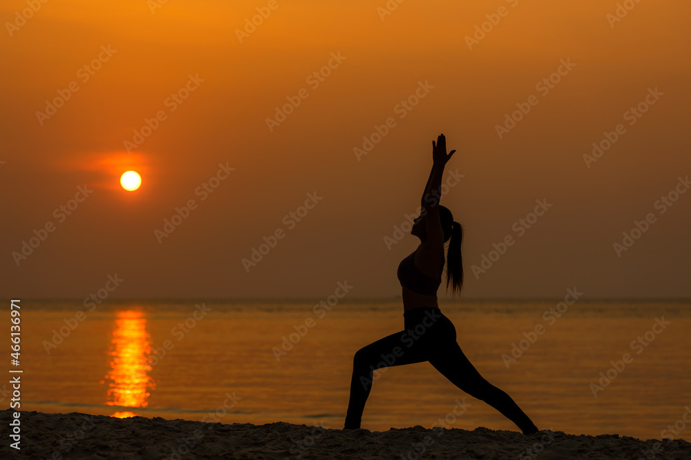 Lifestyle woman yoga exercise and pose for healthy life. Young girl or people pose balance body vital zen and meditation for workout silhouette sunset beach and sea background. Healthy Concept