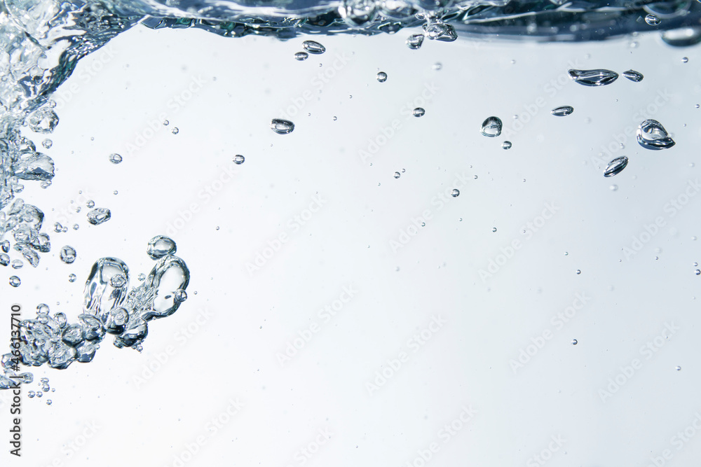 Bubbles of water on blue background