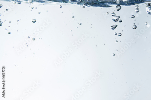 Bubbles of water on blue background
