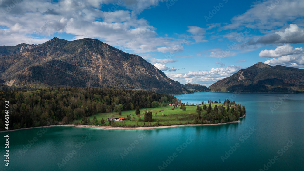 Obraz premium Lake Walchensee in Bavarian Alps from above with white clouds in blue sky, Bavaria 