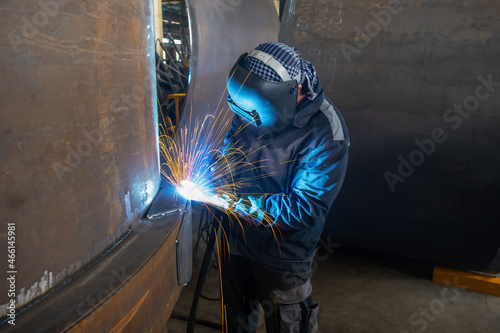 Welding of metal structures by semi-automatic arc welding. MIG welding.