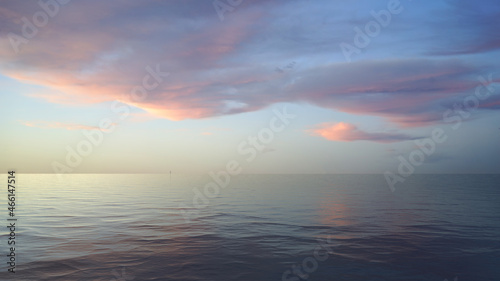 Seascape with pink pastel sky