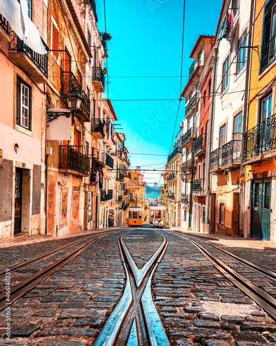 Golden hour image of the historic counter weight tram system  transporting up and down the steeps hills of Lisbon  Portugal