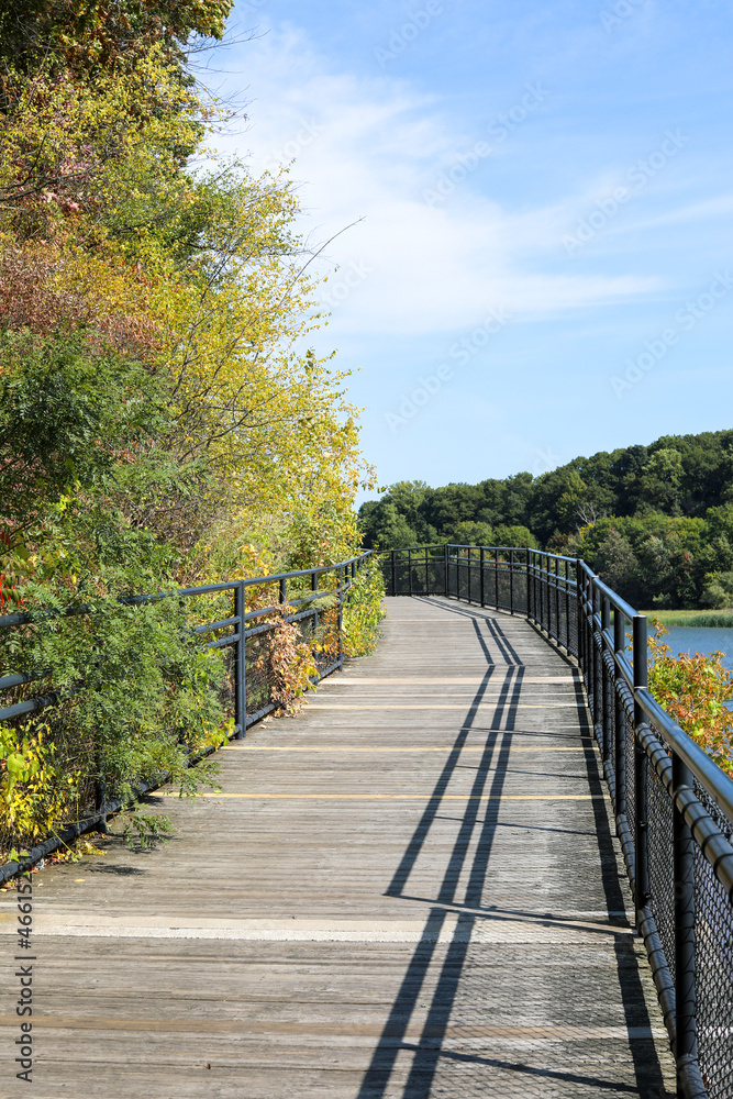 Wooden bridge over the river.  Autumn in Rochester, New York