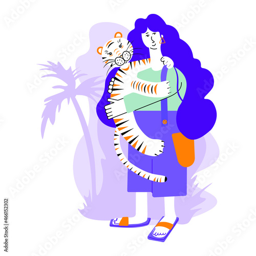 A girl hugs a tiger. International Tiger Day. Hug day.
