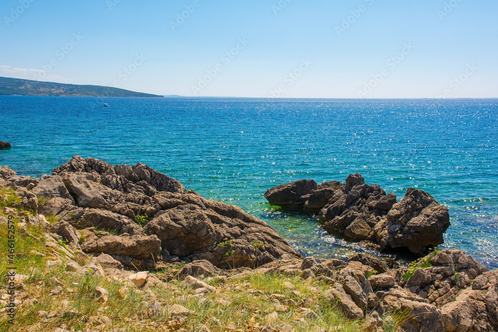 The rocky coastline near Krk Town on Krk Island in the Primorje-Gorski Kotar County of western Croatia
