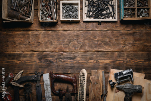 Fotografia Construction work tools on the carpenter workbench flat lay background with copy space