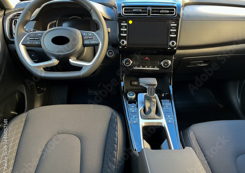 Interior of the car interior. Steering wheel, instrument panel, computer screen, automatic transmission © yarm_sasha