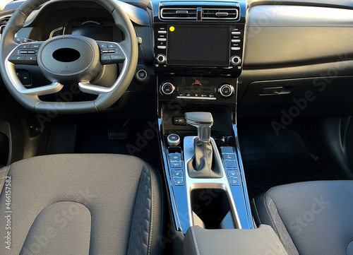 Interior of the car interior. Steering wheel, instrument panel, computer screen, automatic transmission © yarm_sasha
